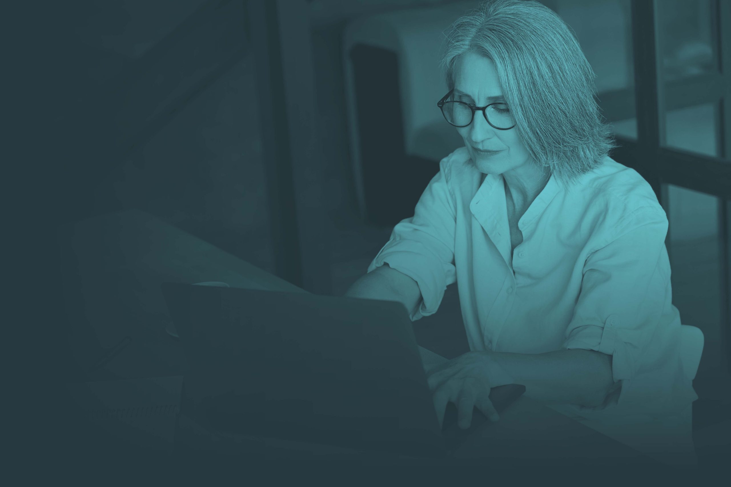 Older woman using laptop