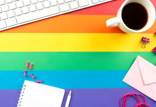 rainbow work desk with items on it