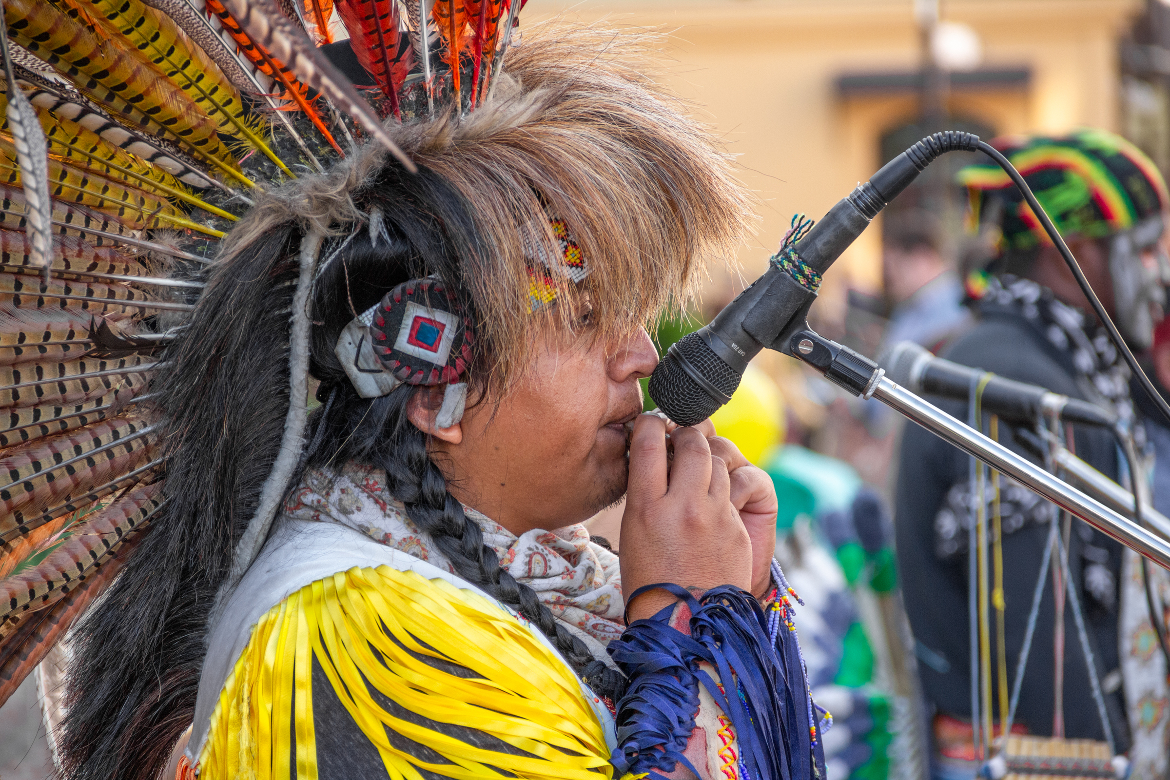 A Native American man performs at a New York festival to celebrate indigenous peoples' culture during National Native American Heritage Month.