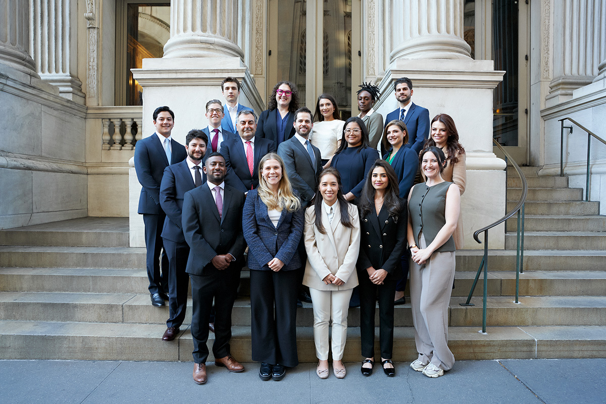 Filippatos White Plains office staff posing on courthouse steps