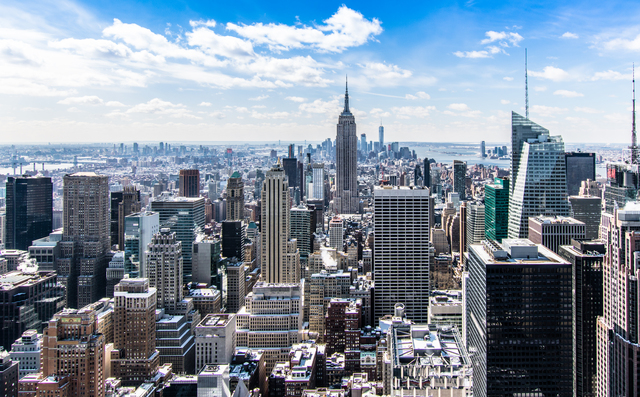 New York City's skyline, featuring the Empire State Building.